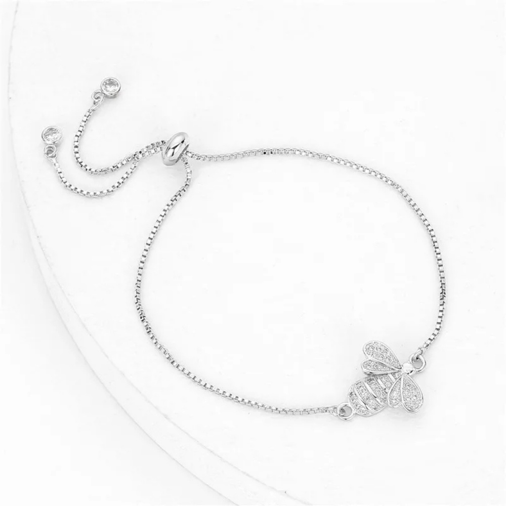 Zirconia bee charm bracelet silver color.